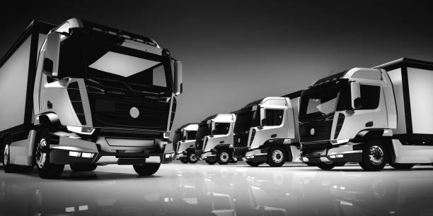 istock Fleet of modern trucks on light background. 1129121023