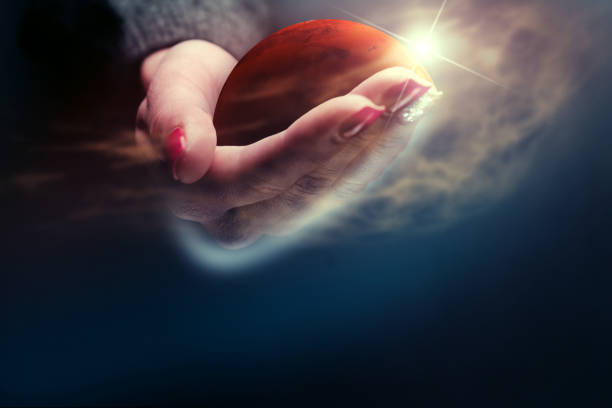 istock Woman holding New Home Mars. Mixed media. 1129121351