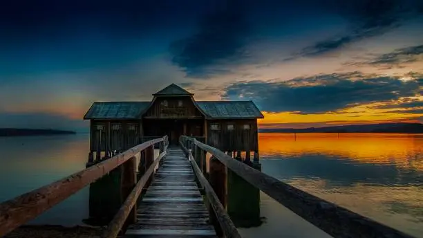 Ammersee wooden boathouse with long pier