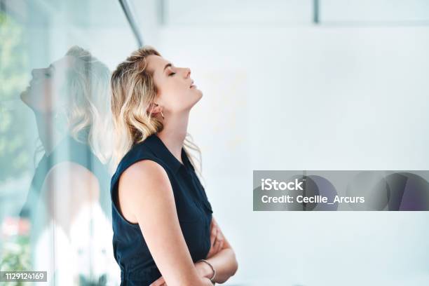Trying To Drag Herself Out Of The Doom And Gloom Stock Photo - Download Image Now - Emotional Stress, One Woman Only, Working