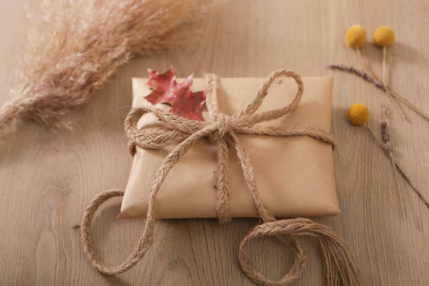 istock Gift wrapped in brown paper 1129124425