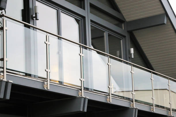 Balcony railing made of glass and stainless steel Balcony railing made of glass and stainless steel balcony stock pictures, royalty-free photos & images