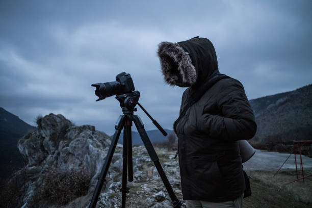 istock Photographer in the dark 1129130591