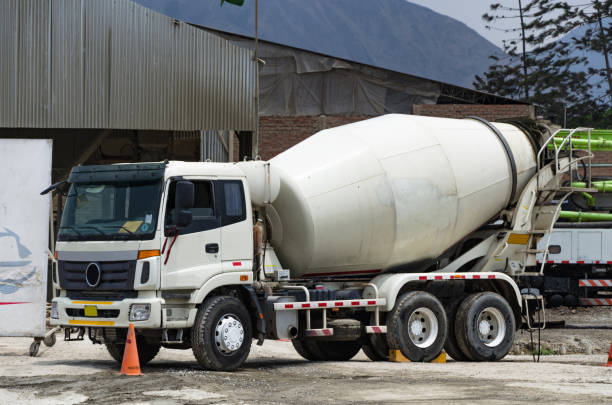 Premixed concrete mixer truck ready for the job stock photo