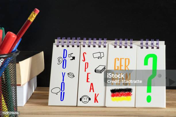 Language School For German Language And Question Speak German Stock Photo - Download Image Now