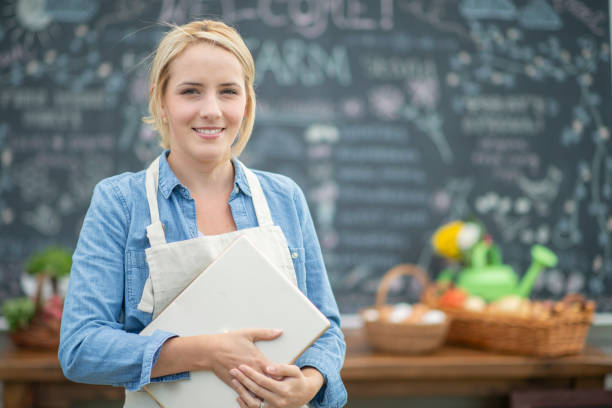 istock Woman Holding Vegetables 1129142053