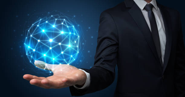istock Businessman holding global connection concept 1129143463