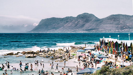 A buzzing Muizenburg Beach in Cape Town, South Africa