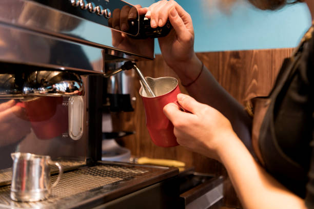 istock Barista preparing coffee milk foam steam 1129145017