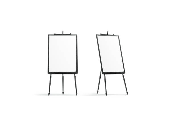 пустой белый вертикальный холст стоять на черном мольберт макет, изолированные - canvas artists canvas white frame стоковые фото и изображения