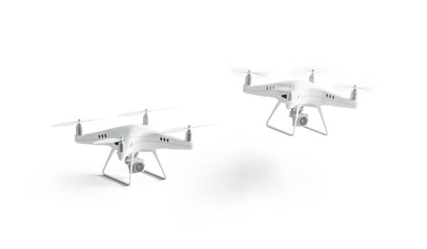 istock Blank white stand and flying quadrocopter mockup, isolated 1129147690