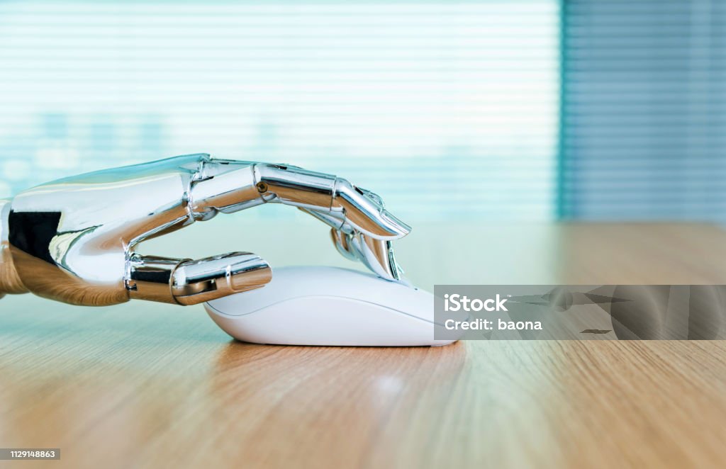 Robost Hand Using Computer Robots Hand Using Computer Mouse Stock Photo - Download Image Now ...