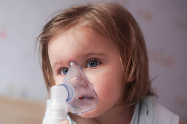 istock Mother inhaling baby. 1129148866