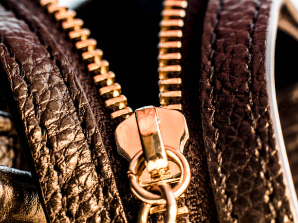 istock a golden zipper of a leather bag 1129148905