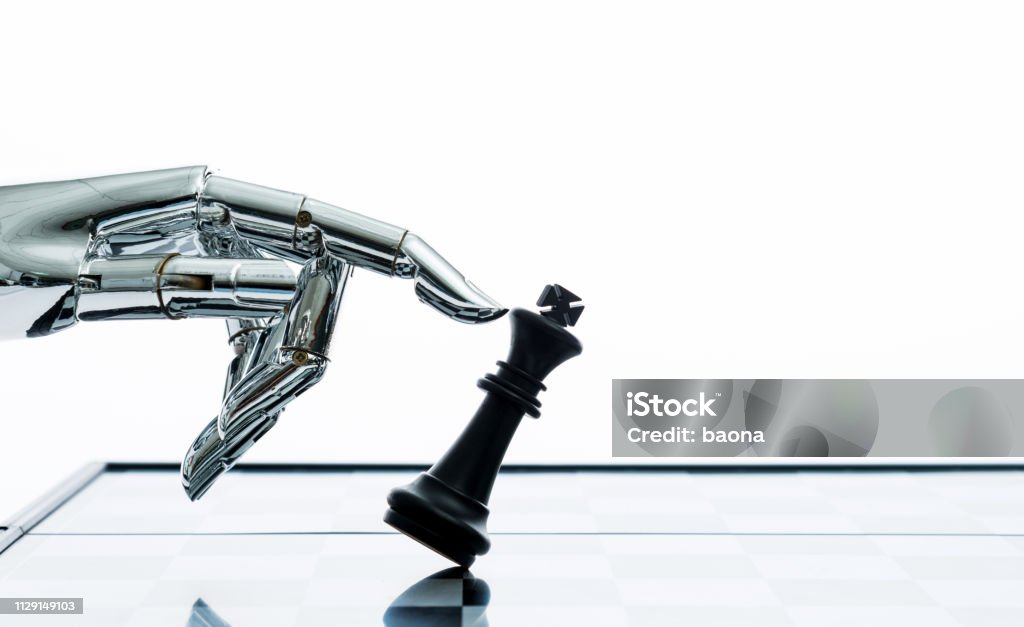 The cyborg is playing chess The cyborg is playing chess. Chess Stock Photo