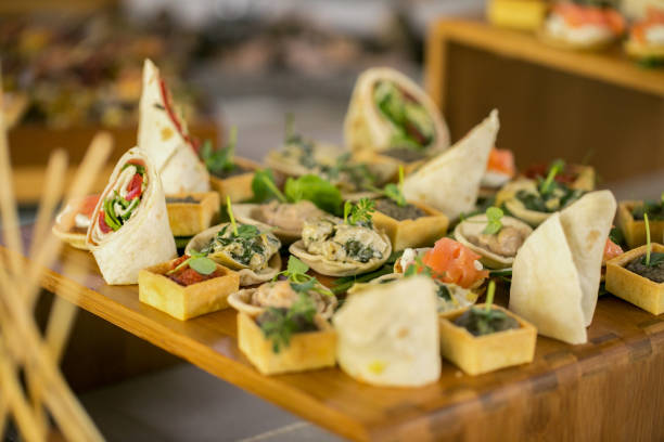 istock Delicious wrap with salad and bacon on table 1129149166