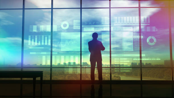 istock Silhouette of a trader in the office before infographics 1129150204