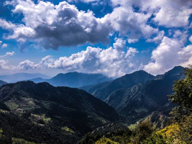 istock Beautiful clouds and mountains  view kanatal Uttarakhand 1129150623
