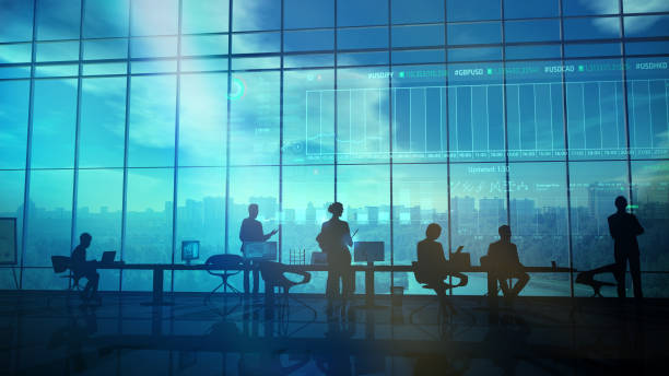 istock A team of traders in front of infographics 1129150787