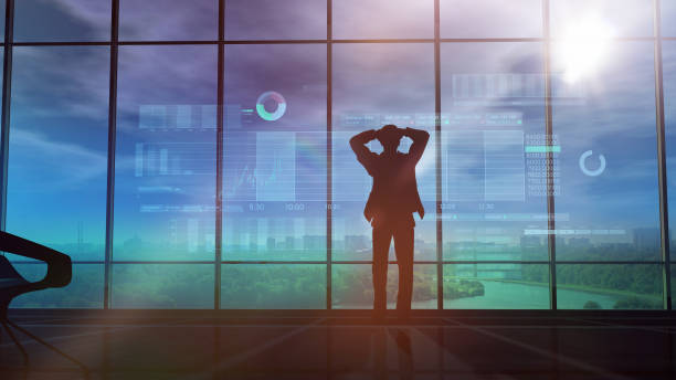istock Male silhouette and stock exchange animation 1129151682