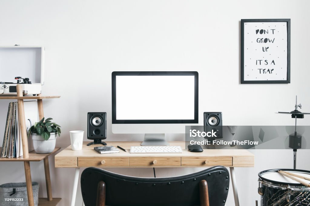 White Scandinavian Interior Of Home Desk With Mock Up Computer Screen Office  Accessories Speakers Vinyl Recoreder And Setup Of Drums Minimalistic Space  For Work Hobby And Listen Music Stock Photo - Download