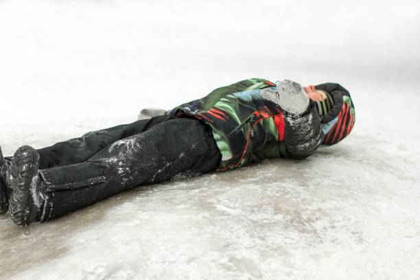 istock Little boy enjoying sleigh ride. Boy with His Sled While Sledding Down the Hill 1129155564