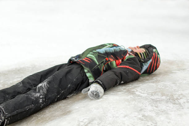 istock Little boy enjoying sleigh ride. Boy with His Sled While Sledding Down the Hill 1129155565
