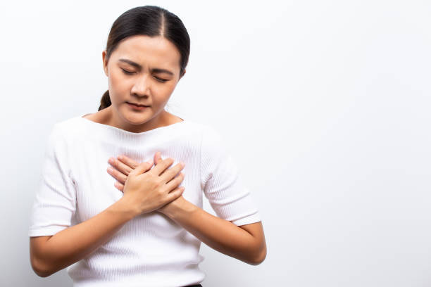 istock Woman has chest pain 1129155705