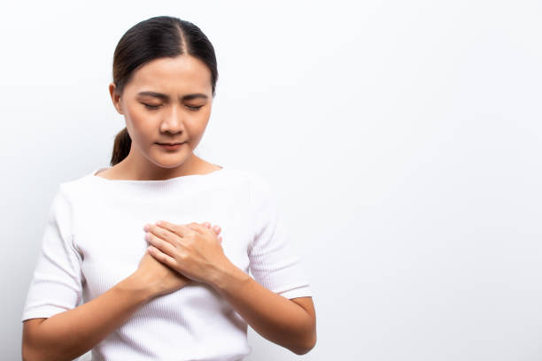 istock Woman has chest pain 1129155713