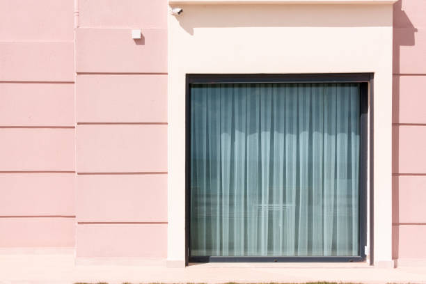 outside of a modern building window and curtain