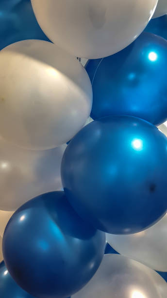 istock beautiful white and blue balloons on birthdays 1129156921