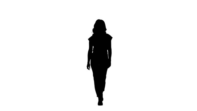 Silhouette Casual woman walking and smiling