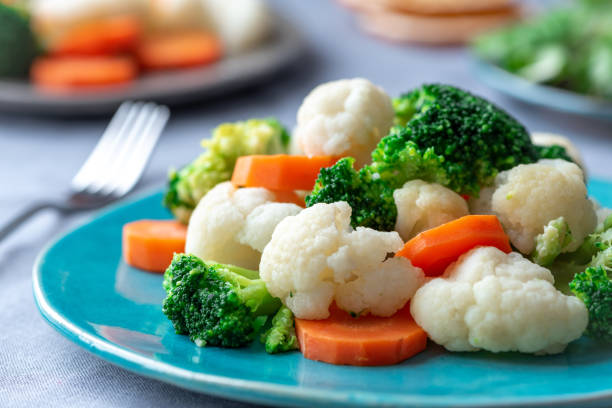 istock Steamed broccoli, cauliflower and carrots. 1129157981