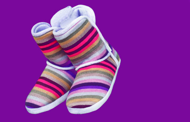 Woolen Uggs With Colored Stripes On A Purple Background Stock Photo -  Download Image Now - iStock