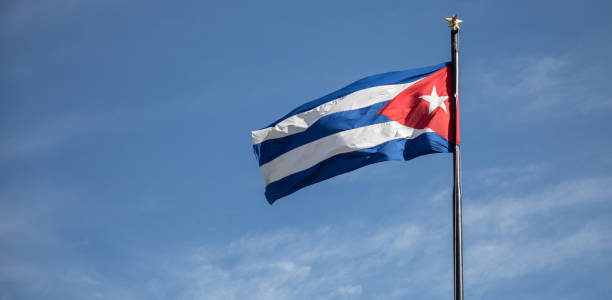 istock Cuba flag flies on a beautiful sunny day, 1129166050