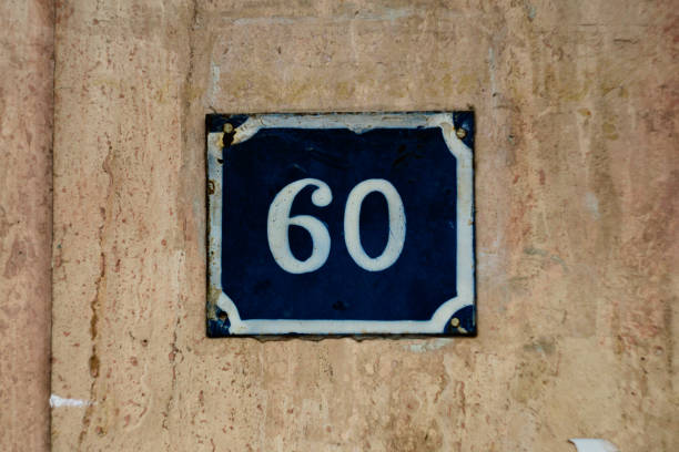 istock old house door number sixty on old wall 1129166065