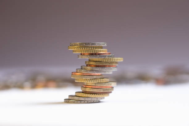 istock Euro coins stacked on each other in different positions. Copy space for text 1129167628