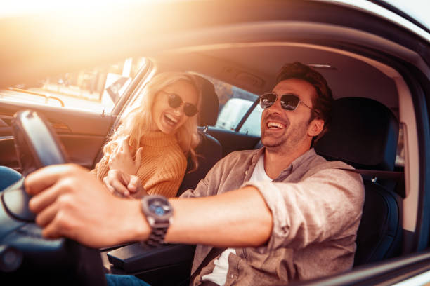 istock Happy young couple enjoying in drive 1129169238