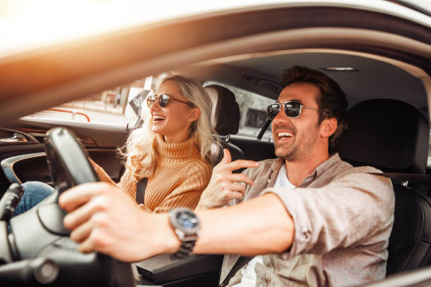 istock Happy young couple enjoying in drive 1129169276