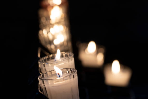 istock church red votive candles white flames 1129171213
