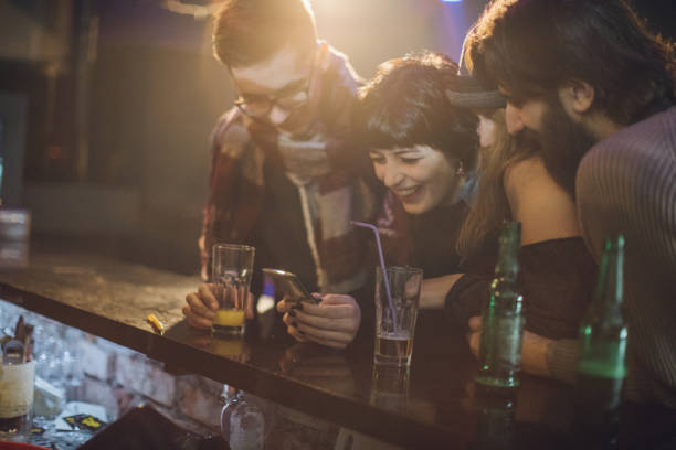 istock Friends in the bar 1129173546