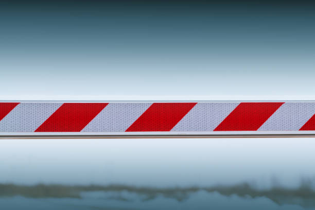 barrier blocking journey against the blue sky.