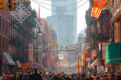 People celebrate the Chinese New Year in the street of Chinatown, New York City