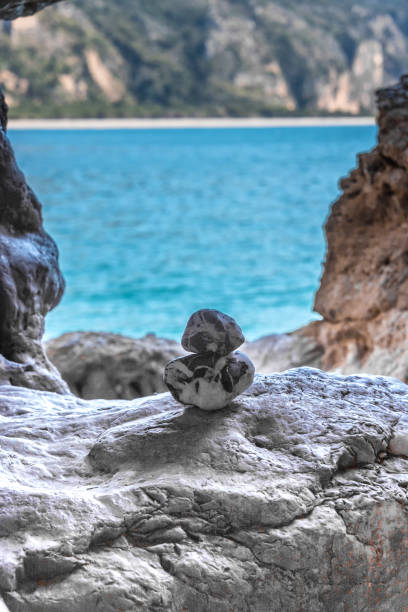 istock Stone Stack In a Cave in Southern Italy on the Mediterranean Coast 1129175371