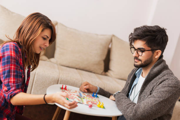 istock Couple playing board games 1129177053