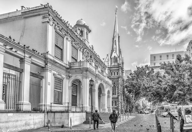 View of Greenmarket Square in Cape Town. Monochrome Cape Town, South Africa, August 17, 2018: A view of Greenmarket Square in Cape Town in the Western Cape Province. The Iziko Old Town House Museum and the Central Methodist Mission Church are visible. Monochrome methodist stock pictures, royalty-free photos & images