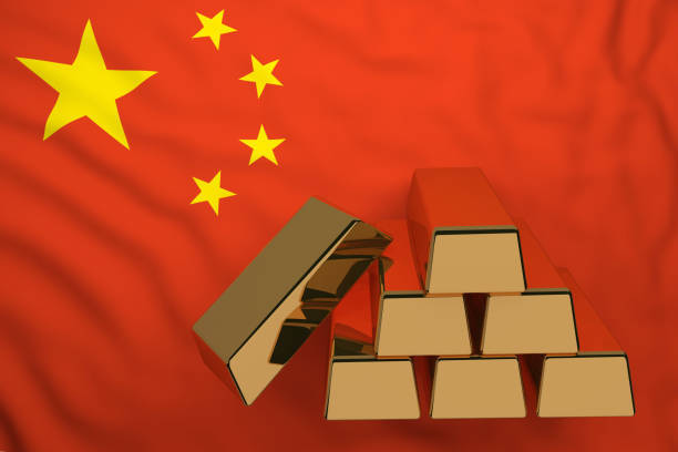 istock gold bars on flag China 1129179874
