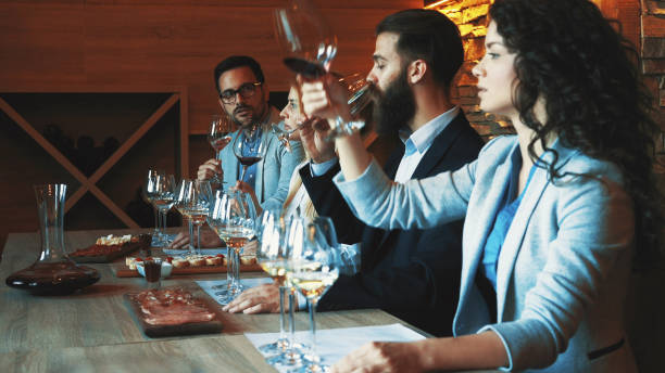 istock Friends tasting wine together 1129182101