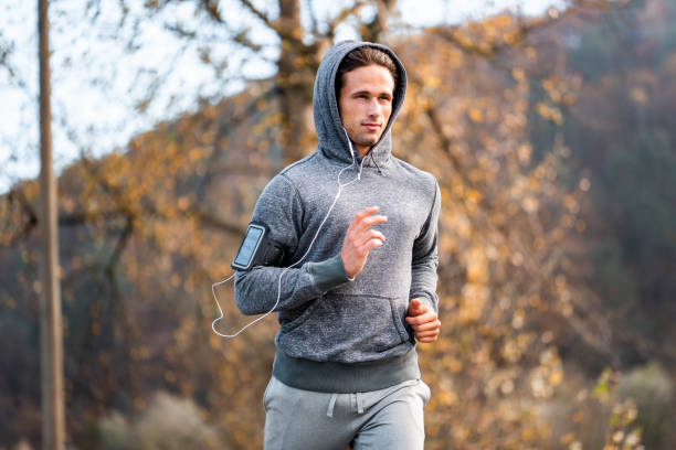 istock Young male athlete running in the nature 1129182228