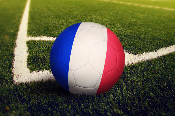 france ball on corner kick position, soccer field background. national football theme on green grass. - france flag imagens e fotografias de stock